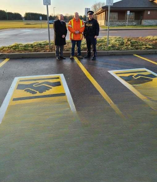 What the Handshake Symbol on a Parking Space Really Means: How Community Exchange Zones Promote Safer In-Person Transactions