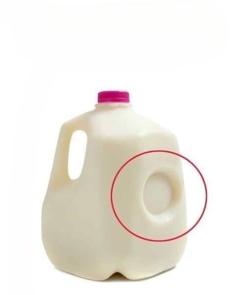 The Hidden Purpose Behind the Small Dent on Milk Jugs (And Why It Matters More Than You Think)