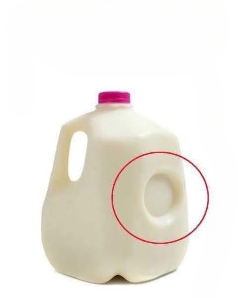 The Hidden Purpose Behind That Little Dent on Your Milk Jug — And Why It Matters More Than You Think