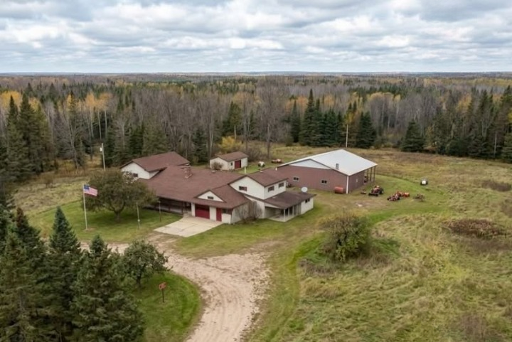 31-Acre Rural Retreat in Michigan Offers Privacy, Pond Views, and Endless Potential
